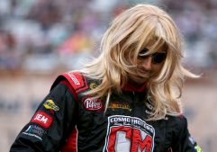 BRISTOL, TN - AUGUST 20:  Matt DiBenedetto, driver of the #83 Cosmo Motors Toyota, is introduced in a wig prior to the NASCAR Sprint Cup Series Bass Pro Shops NRA Night Race at Bristol Motor Speedway on August 20, 2016 in Bristol, Tennessee.  (Photo by Sean Gardner/Getty Images)